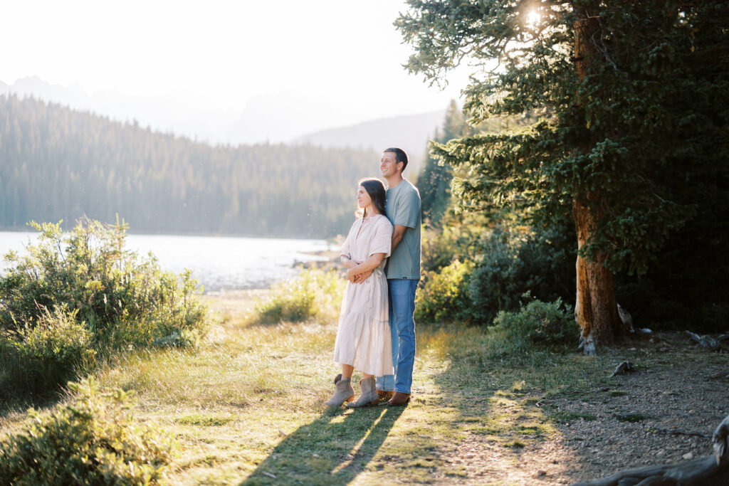 Couple cuddling during mountain photo session near Boulder, Colorado