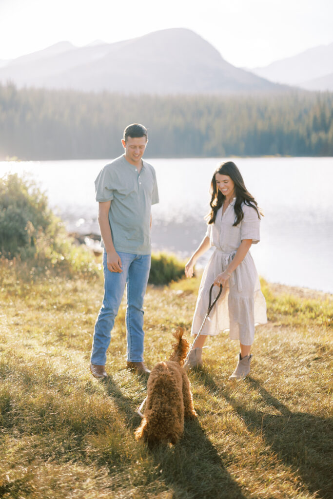 Playful couples portrait session near Denver with pine forest views